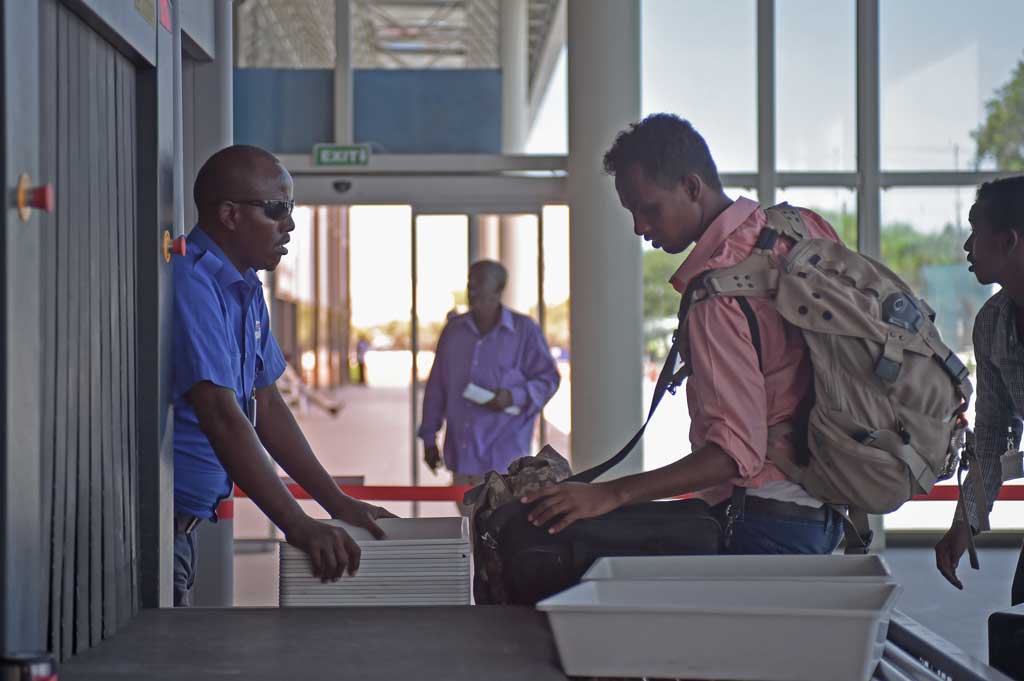 Everyone is happy to see the TSA drop the shoe-removal security requirement at American airports. (Photo via Wikimedia Commons)